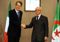 Algerian Foreign Minister Mourad Medelci (R) shakes hands with his Italian counterpart Giulio Terzi Di Sant'Agata after a joint press conference on March 15, 2012 in Algiers. The ministers affirmed the common interests of the two countries regarding security and stability in the Mediterranean. AFP PHOTO/FAROUK BATICHE (Photo credit should read FAROUK BATICHE/AFP/Getty Images)