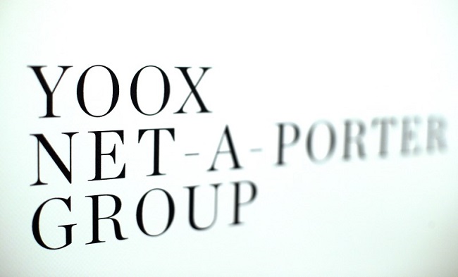 Yoox Net-A-Porter Group placard is seen in Bologna